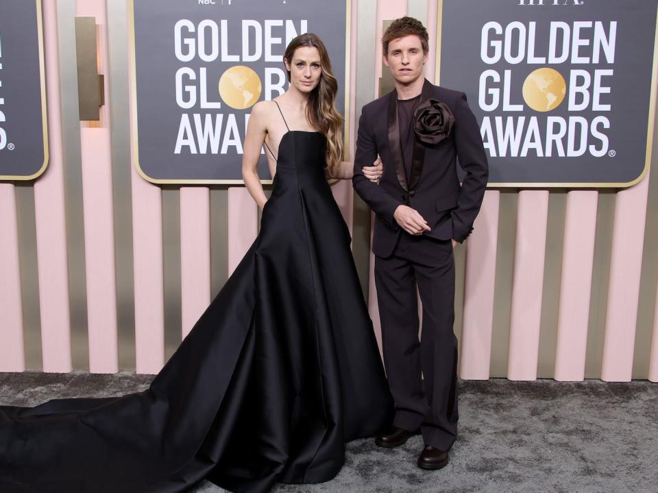 Hannah Bagshawe and Eddie Redmayne attend the 2023 Golden Globes.