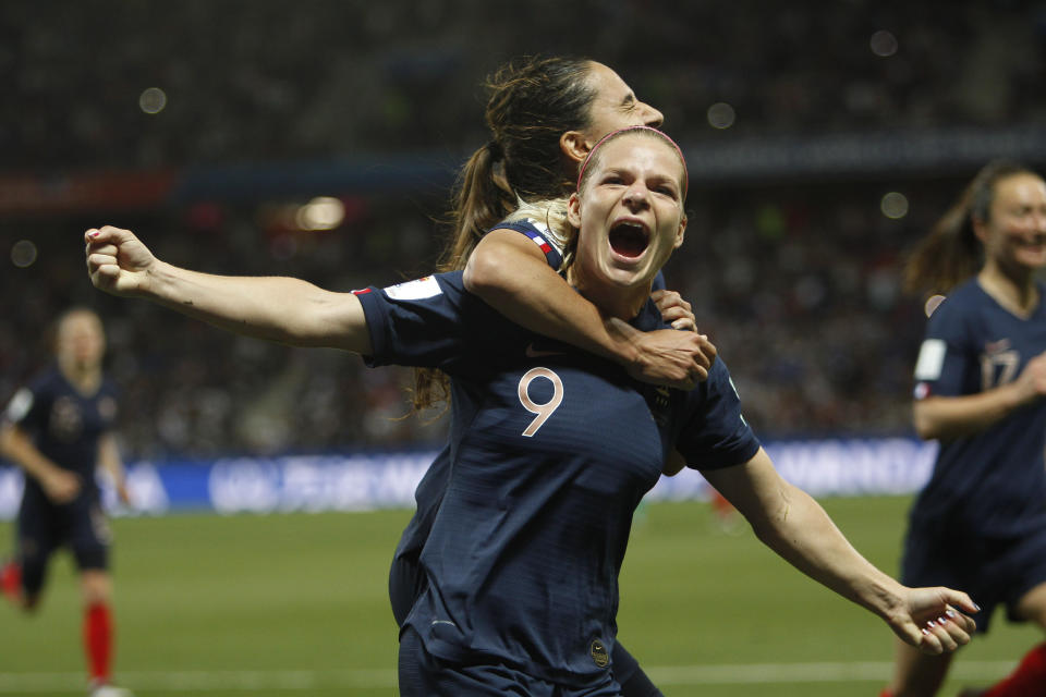 France's Eugenie Le Sommer, celebrates with France's Amel Majri after scoring her side's second goal on a penalty kick during the Women's World Cup Group A soccer match between France and Norway in Nice, France, Wednesday, June 12, 2019. (AP Photo/Claude Paris)