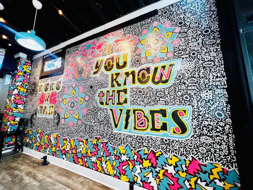 Inside Koko+Rae, which opened this month in the Highlands, a mural reads, "You know the mural."