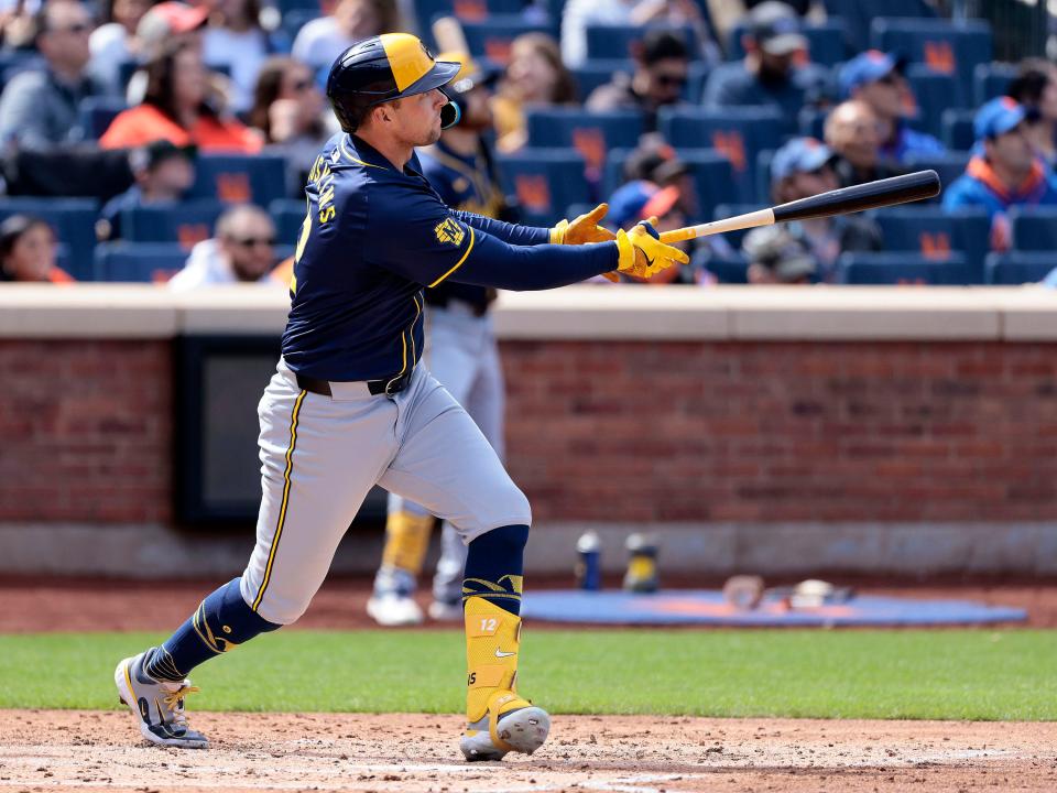 Brewers designated hitter Rhys Hoskins watches his two-run homer in the top of the third inning against the Mets on Saturday. He went 3 for 4 with four RBI.