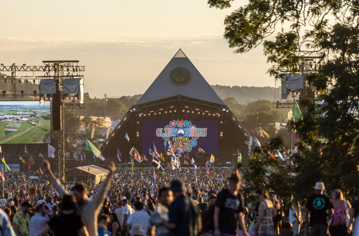 Crowds gather to watch the main acts performing on the main Pyramid Stage at Glastonbury 2023