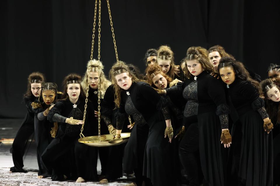 Members of the Arlington High School winter guard are photographed during their gold medal performance at the WGI world championships on April 12, 2024 in Dayton, Ohio.