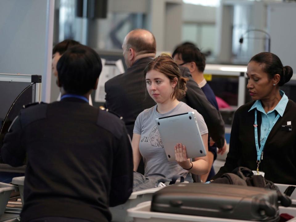 Airport security laptops