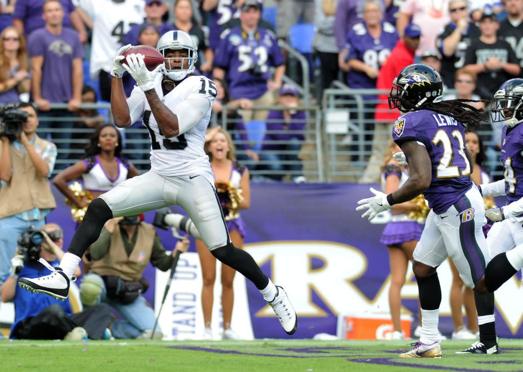 Oct 2, 2016; Baltimore, MD, USA; Oakland Raiders wide receiver Michael Crabtree (15) catches a touchdown pass in the fourth quarter against the Baltimore Ravens at M&T Bank Stadium. Mandatory Credit: Evan Habeeb-USA TODAY Sports