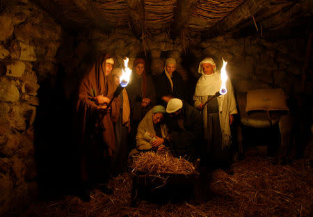 FILE PHOTO: Israeli Arabs perform a nativity scene for tourists in the northern town of Nazareth December 22, 2008. REUTERS/Baz Ratner/File Photo