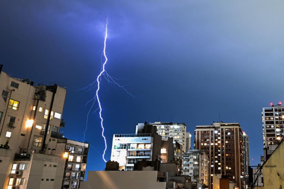 A lightning strikes the city of Buenos Aires during a storm on May 23, 2023. (Photo by LUIS ROBAYO / AFP) (Photo by LUIS ROBAYO/AFP via Getty Images)