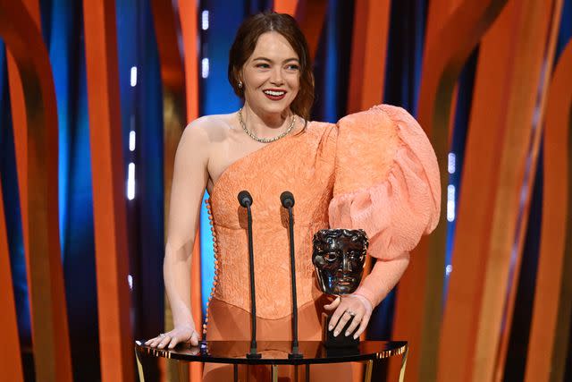 <p>Kate Green/BAFTA/Getty</p> Emma Stone at the 2024 BAFTA Film Awards