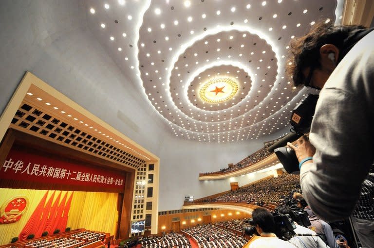 The inside of the Great Hall of the People, seen during the opening session of the National People's Congress (NPC) in Beijing on March 5, 2013. China targeted 2013 economic growth of 7.5 percent and vowed to tackle corruption and improve the quality of life as an annual parliamentary session to seal its transition to new leadership started