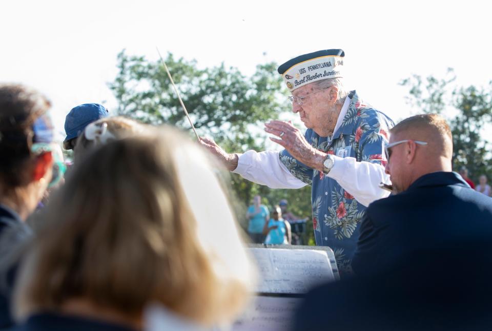 104-year-old Pearl Harbor survivor Frank Emond conducts the Pensacola Civic Band during their Memorial Day concert at Community Maritime Park in Pensacola on Monday, May 30, 2022.