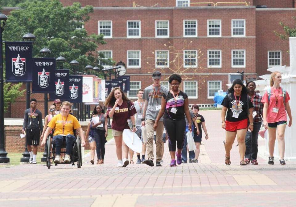 Incoming Winthrop University freshman walk to an activity Friday during orientation. The future students stay on campus for two days during the summer to prepare for life at college.