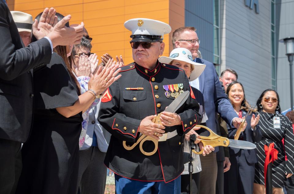 Vietnam veteran Tino Adame, center, participates in a ribbon-cutting ceremony for the new Richard A. Pittman VA clinic in French Camp on Apr. 25, 2024.