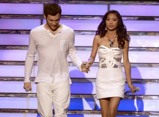 "American Idol" Finalists Phillip Phillips and Jessica Sanchez walk onstage during the 2012 results show at the Nokia Theatre in Los Angeles on May 23. President Benigno Aquino led the heartbroken Philippines in heaping praise Thursday on Sanchez, who is of Filipino-Latino heritage, following her loss in the final of the US talent show