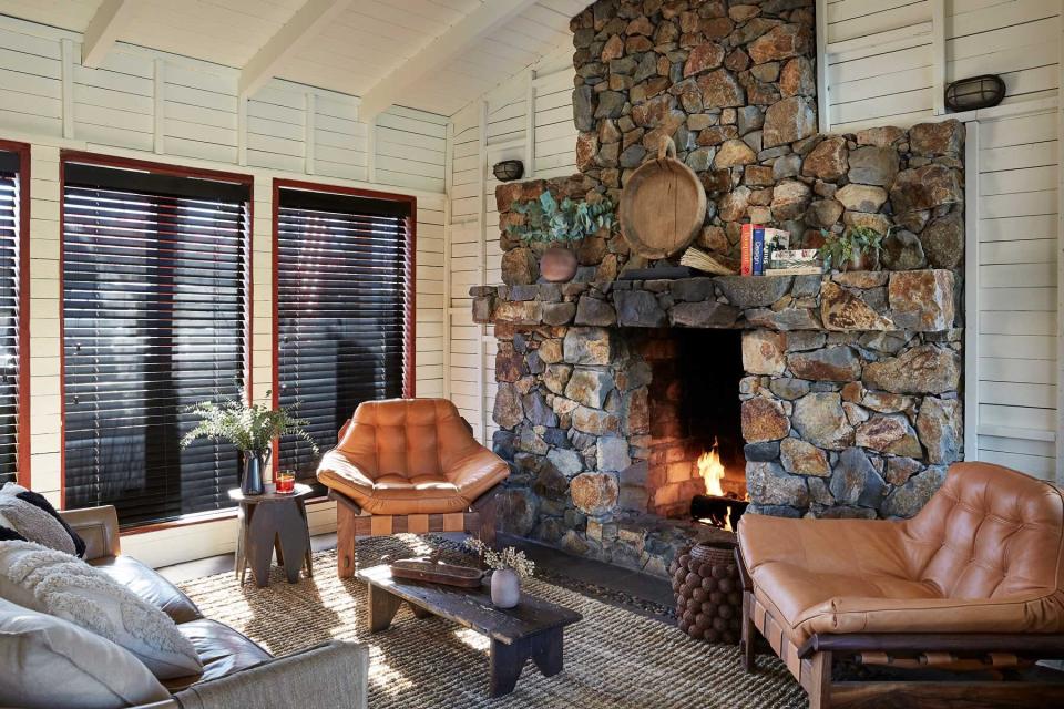 Fireplace and seating at Sparrows Lodge