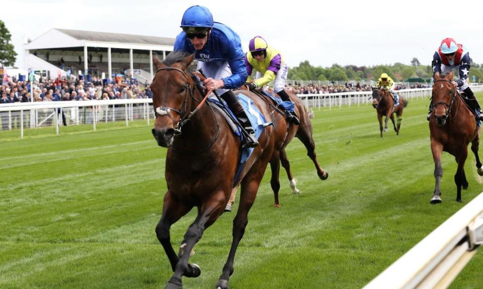 Harry Angel and the jockey Adam Kirby and take the Duke Of York Stakes at the Dante meeting.