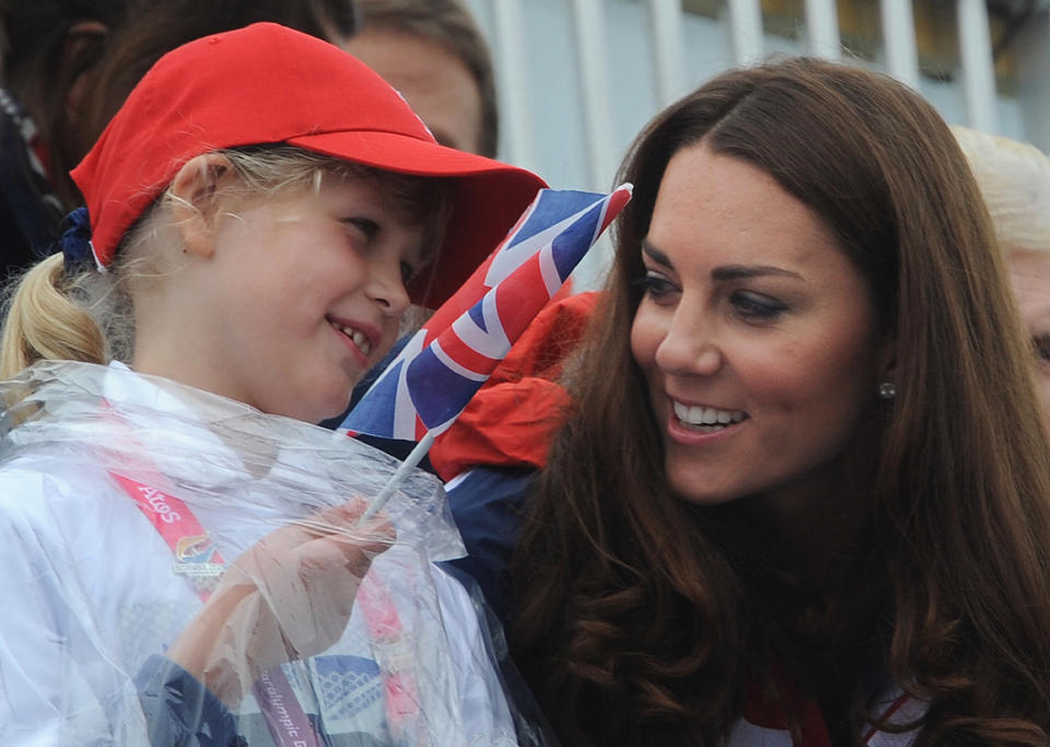 Britain's Catherine, Duchess of Cambridge (R) and Lady Louise Windsor watch the rowing finals during the London 2012 Paralympic Games at Eton Dorney, west of London, on September 2, 2012.  AFP PHOTO / STEFAN ROUSSEAU/POOL        (Photo credit should read STEFAN ROUSSEAU/AFP/GettyImages)