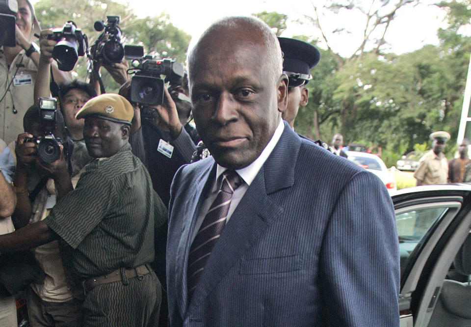 FILE - In this file photo dated April 12, 2008, Angola's President Jose Eduardo dos Santos arrives at the Mulungushi International Conference Center in Lusaka, Zambia. dos Santos announced Friday Feb. 3, 2017, in an address to his ruling MPLA party that he will not run in elections scheduled for August 2017, ending his 38 years in power. (AP Photo/Themba Hadebe, FILE)