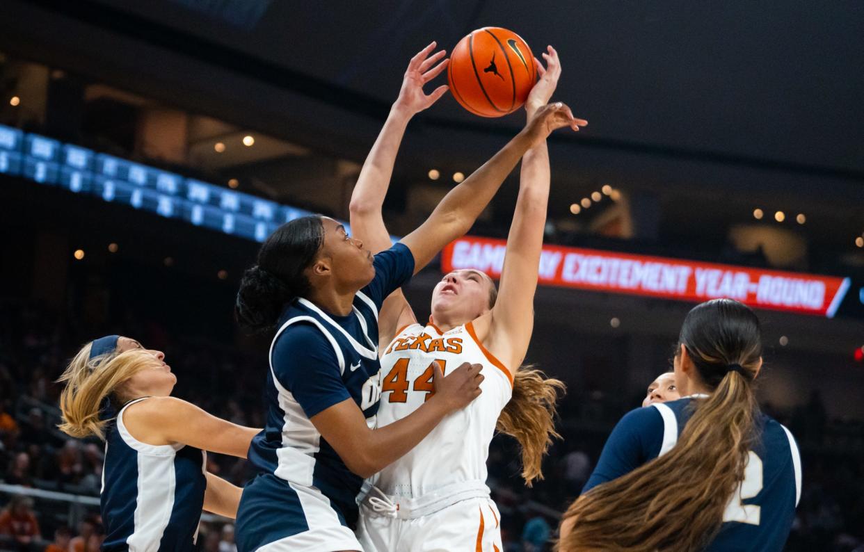 Texas forward Taylor Jones secures a rebound under the basket in the second half of Wednesday's 112-74 win over Oral Roberts on Wednesday at Moody Center. The 112 points were a season-high for the 8-0 Longhorns. Texas hosts UConn on Sunday.