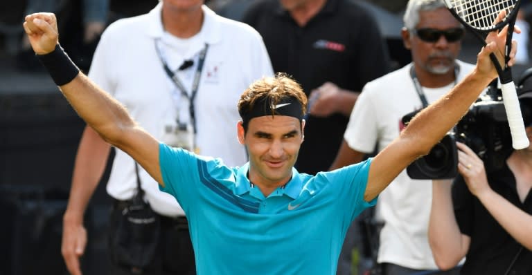 On top of the world: Roger Federer reacts after winning his semi-final against Nick Kyrgios