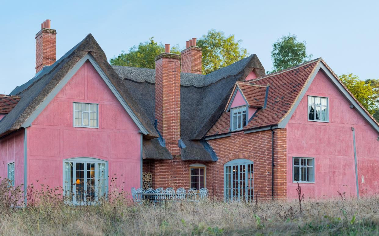 The pink-painted Farmhouse at Wilderness Reserve is a difficult place for families and groups of friends to leave - Cameron Maynard / Aperto 2016