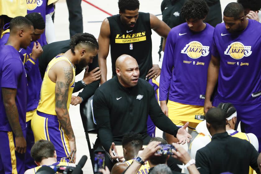 DENVER, CO - MAY 16: Los Angeles Lakers coach Darvin Hamm speaks with his team during halftime during the first half of Game 1 of the NBA Conference Finals Western Playoffs against the Denver Nuggets at Ball Arena on Tuesday, May 16, 2023 in Denver, Colorado (Robert Gauthier / Los Angeles Times)