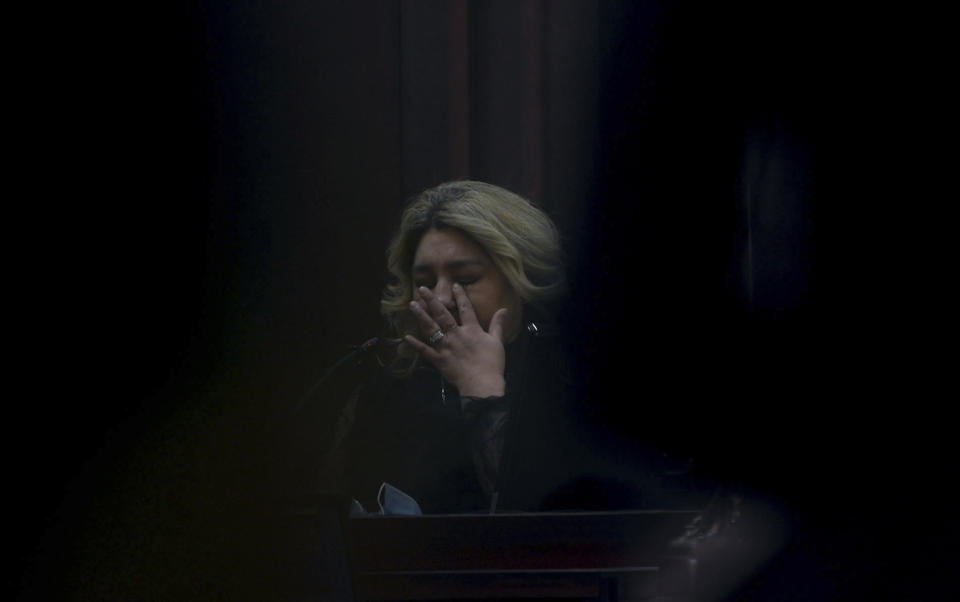 Patricia Perez begins to weep while giving a victim impact statement at Justice A.A. Birch Building in Nashville, Tenn., on Saturday, Feb. 5, 2022. Jurors are hearing testimony about whether or not to make parole possible after 51 years in prison for Travis Reinking, the man who shot and killed four people at a Nashville Waffle House in 2018. Jurors on Friday rejected Reinking’s insanity defense as they found him guilty on 16 charges, including four counts of first-degree murder. (Nicole Hester/The Tennessean via AP, Pool)