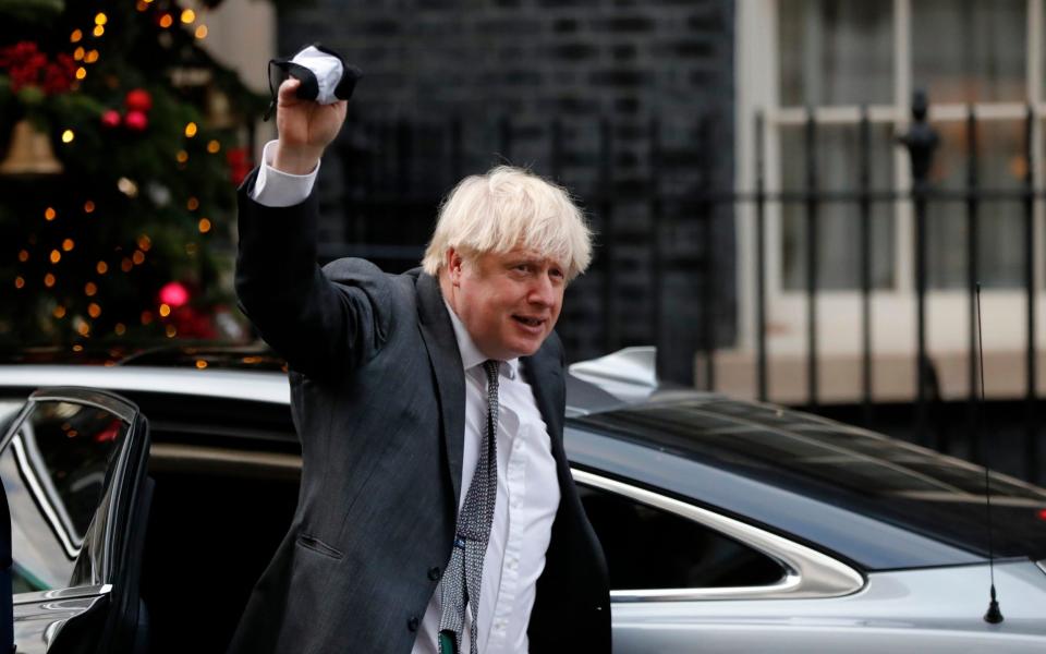 Boris Johnson arrives at 10 Downing Street on Wednesday, December 30, 2020 after the trade deal is formally signed - Frank Augstein /AP