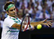 Switzerland's Roger Federer hits a shot during his semi-final match against Serbia's Novak Djokovic at the Australian Open tennis tournament at Melbourne Park, Australia, in this January 28, 2016 file photo. REUTERS/Thomas Peter/Files