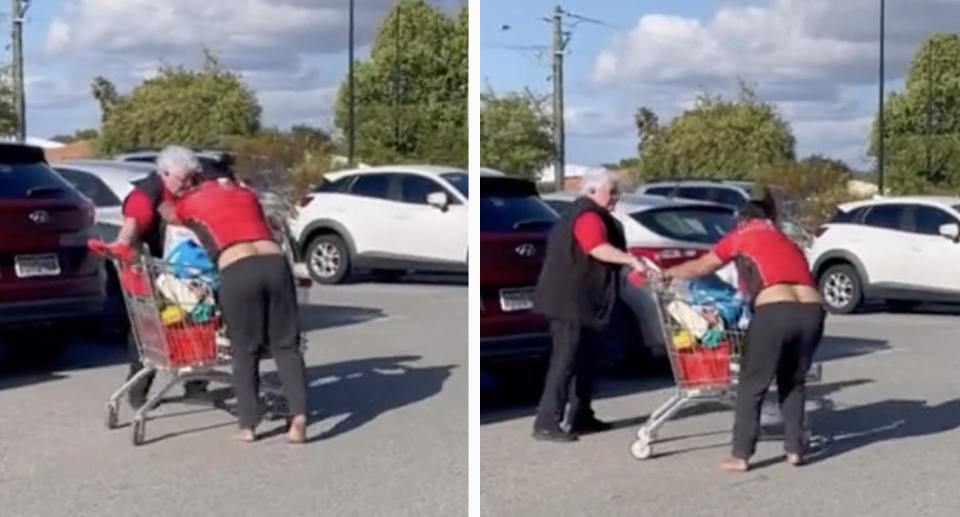 A Coles employee holds the trolley while the woman allegedly tries to take it.