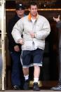 <p>It’s never too cold for a pair of Adidas shorts. He paired his gym attire with a puffy coat in 2011. (Photo: Christopher Peterson/BuzzFoto/FilmMagic)</p>