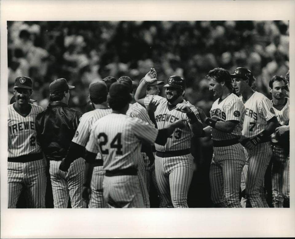 Joey Meyer is mobbed by teammates after socking the winning home run off Roger Clemens in the opener of a doubleheader Aug. 9, 1988.