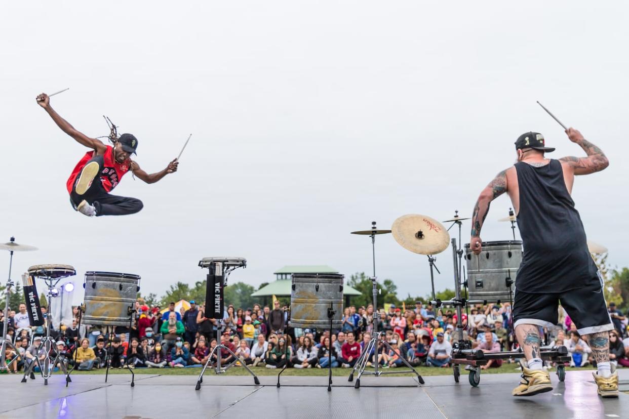 Drummers perform at BuskerFest in 2022. This year's event will feature hundreds of entertainers, including break dancers, acrobats and aerialists. (Submitted by Mackenzie Muldoon - image credit)