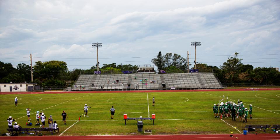 The Cypress Lake High School lacrosse team plays in a recent match against Fort Myers High School. Lacrosse is one  of the Southwest Florida high school sports that has seen a decline in participation over the last several years.