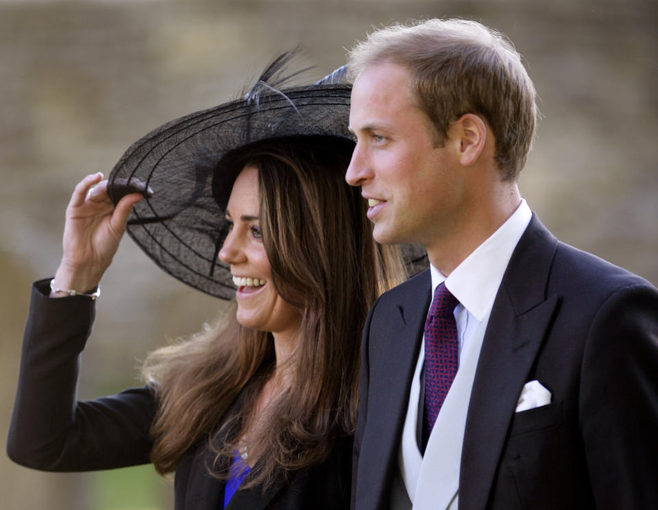 William and Kate attend the October 2010 wedding of their friends Harry Meade and Rosie Bradford in Northleach, England.