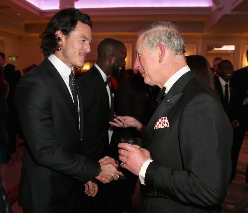 The Prince of Wales meets actor Luke Evans at a reception for The Prince’s Trust Invest in Futures Gala Dinner at The Savoy hotel, London, in 2014 (Chris Jackson/PA) (PA Archive)