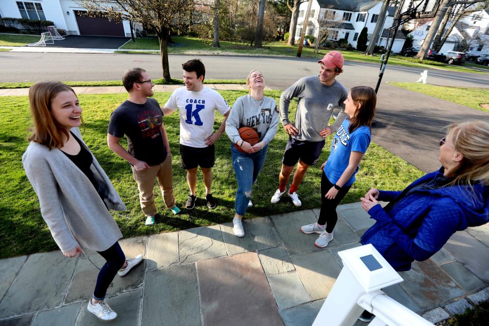 Throughout the coronavirus pandemic, Rita Stephanz, right, is hosting her children, their friends, and significant others in her Larchmont, N.Y. home. Along with Stephanz, members of the newly formed household, photographed March 26, 2020 are from right, her daughters Liza, 24, and Hannah, 27, son Grant, 17, John Hammel Strauss, 27, Zach Blumenfeld, 27, and John's sister Marian, 23, all of New York City. 