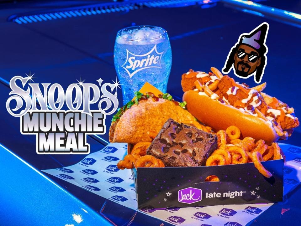 A promotional image of Snoop's Munchie Meal at Jack in the Box, which features a large drink, a brownie, curly fries, a taco, and a hot dog.