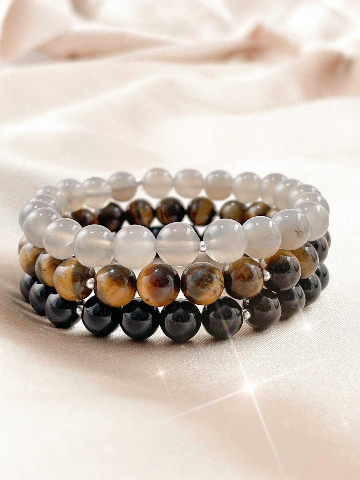 <p><a href="https://truewarriorjewelry.com/collections/stacks/products/strength-stack-grey-agate-tiger-eye-onyx-healing-bracelet?variant=40206626914349" rel="nofollow noopener" target="_blank" data-ylk="slk:Shop Now;elm:context_link;itc:0;sec:content-canvas" class="link rapid-noclick-resp">Shop Now</a></p><p>Strength Stack</p><p>truewarriorjewelry.com</p><p>$67.90</p>