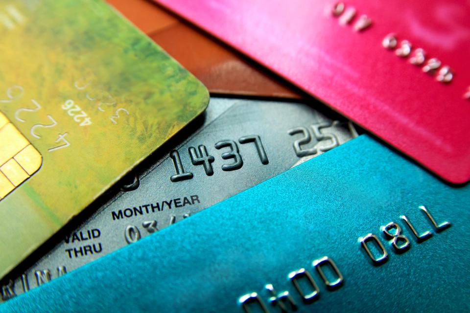 Stack of colorful credit cards.