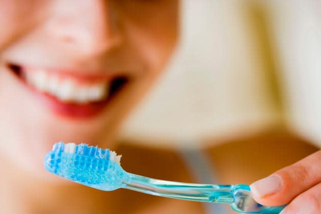 <b>1. Good oral care.</b> It goes without saying that good oral care is important (and the easiest) when it comes to beating bad breath, leaving you with that minty freshness. So brush your teeth twice a day and floss at least once daily to remove the plaque and bacteria that accumulate in your mouth. Start by brushing right, as<a href="http://www.rd.com/slideshows/10-tips-for-healthy-whiter-teeth/#slideshow=slide2" rel="nofollow noopener" target="_blank" data-ylk="slk:recommended by Dr. Katz in Reader’s Digest;elm:context_link;itc:0;sec:content-canvas" class="link "> recommended by Dr. Katz in Reader’s Digest</a>: Place your toothbrush at a 45-degree angle against your gums and gently move it in a circular motion, rather than a back-and-forth motion. Make sure you don’t scrub too hard to avoid damaging your gums. And by all means, gurgle with some mouthwash for instant fresh breath!