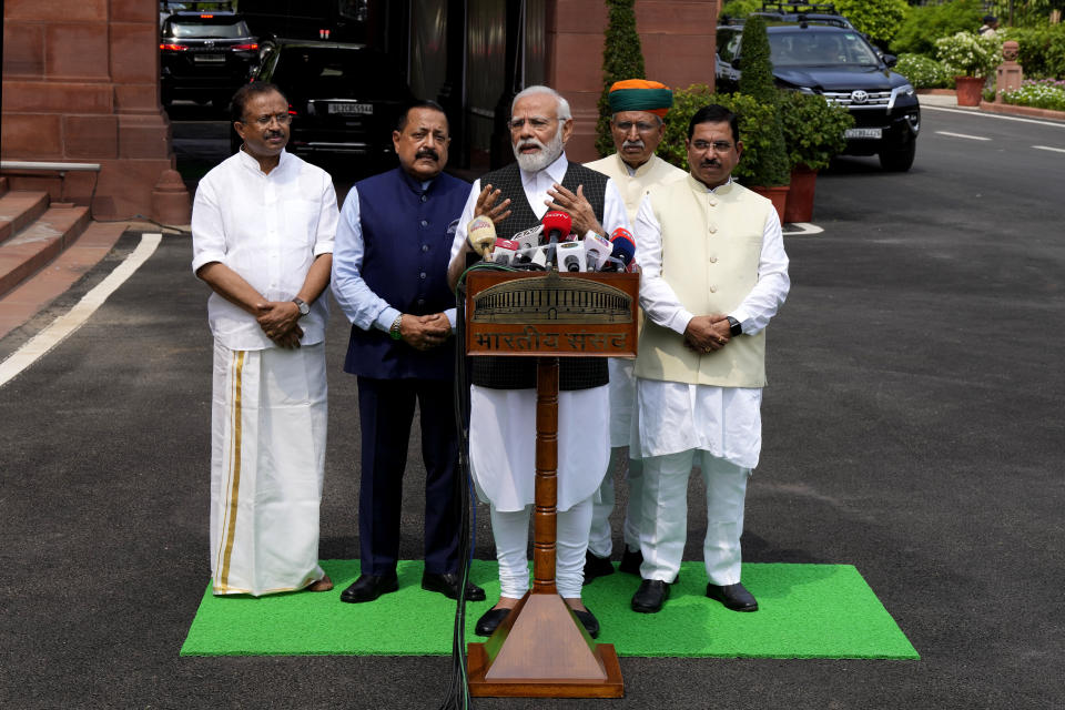 Indian Prime Minister Narendra Modi speaks as he arrives on the opening day of the monsoon session of the Indian parliament in New Delhi, India, Thursday, July 20, 2023. Modi Thursday broke more than two months of his public silence over the deadly ethnic clashes that have marred the country's remote northeast Manipur state, a day after a viral video showed two women being paraded naked by a mob, sparking outrage across the nation. (AP Photo/Manish Swarup)