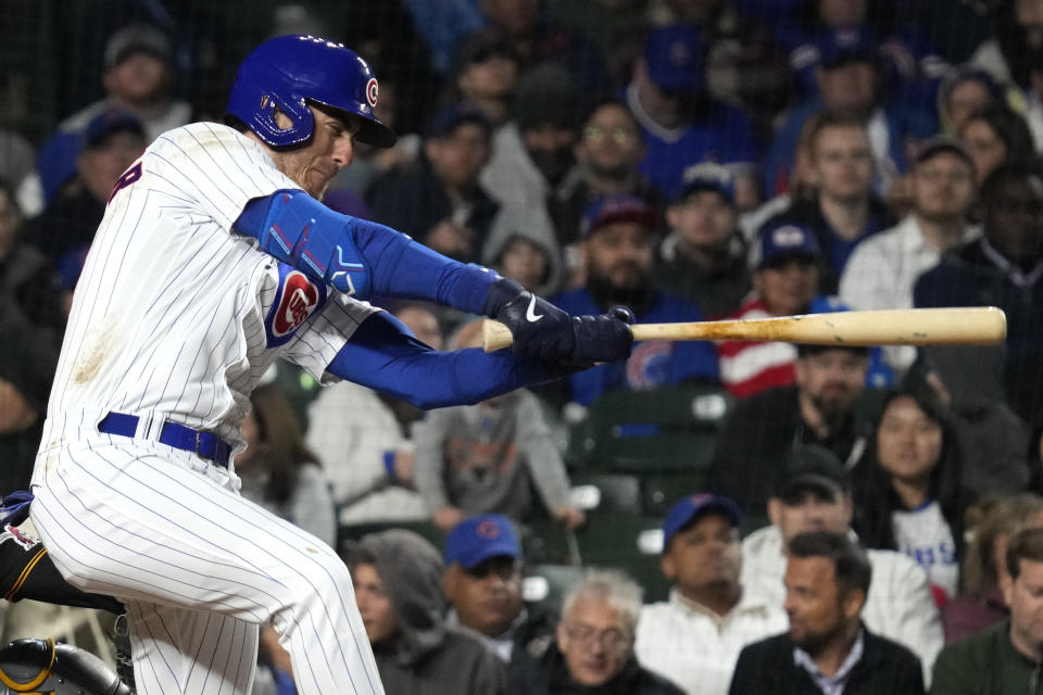 Chicago Cubs' Cody Bellinger hits a one-run double during the fifth inning of a baseball game against the Pittsburgh Pirates in Chicago, Thursday, June 15, 2023. (AP Photo/Nam Y. Huh)
