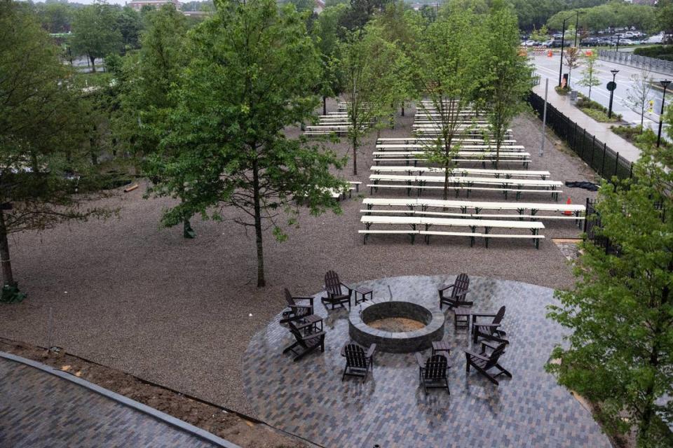 The beer garden outside Olde Mecklenburg Brewery’s second location anchoring Bowl at Ballantyne includes a beer hut, bathrooms, playground, fire pit, bench seating and a private rental area.