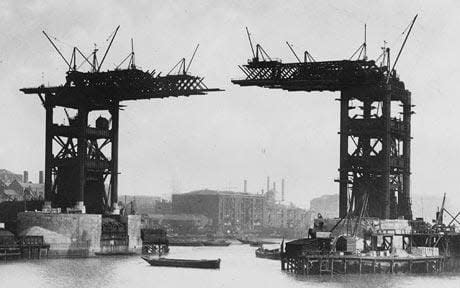 Tower Bridge under construction - Credit: getty