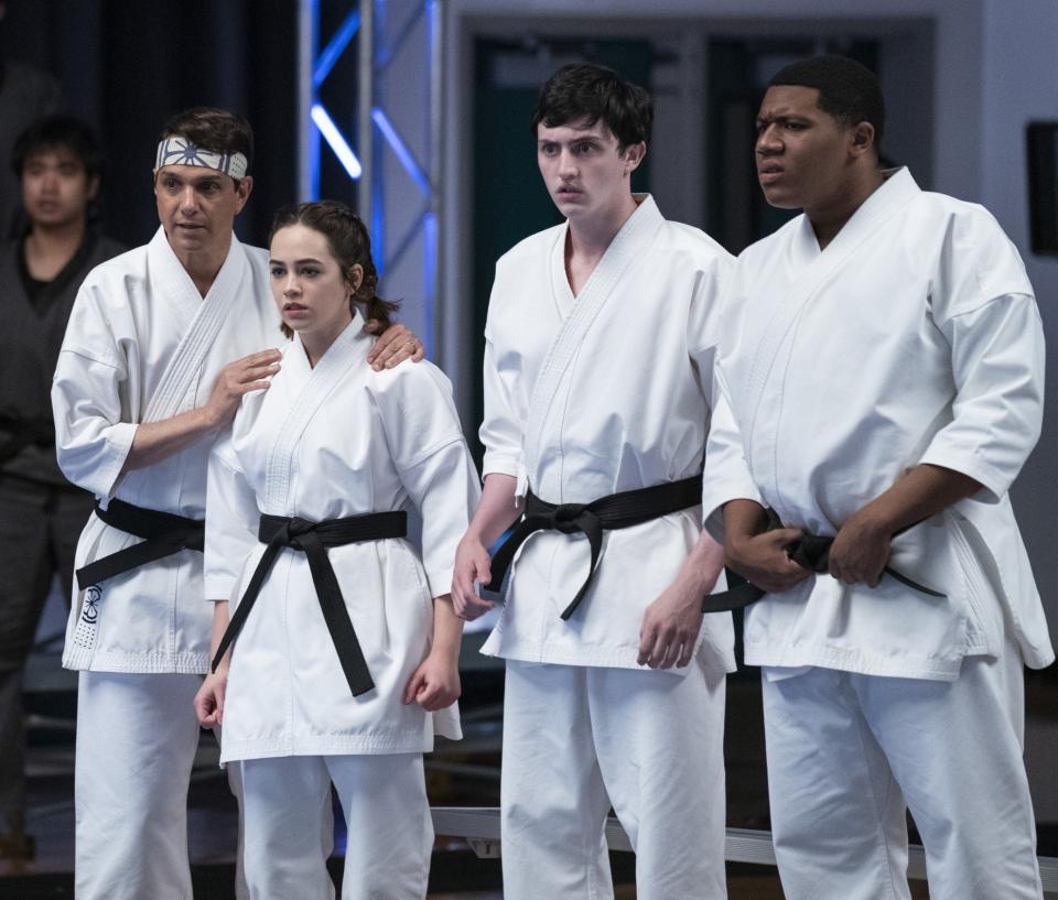 Ralph Macchio, Mary Mouser, Gianni DeCenzo and Khalil Everage in Cobra Kai