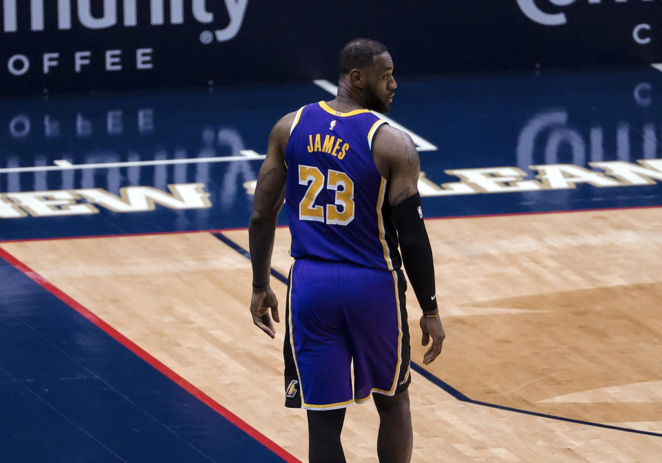 Los Angeles Lakers forward LeBron James (23) looks to the bench in the fourth quarter of an NBA basketball game against the New Orleans Pelicans in New Orleans, Sunday, May 16, 2021. (AP Photo/Derick Hingle)