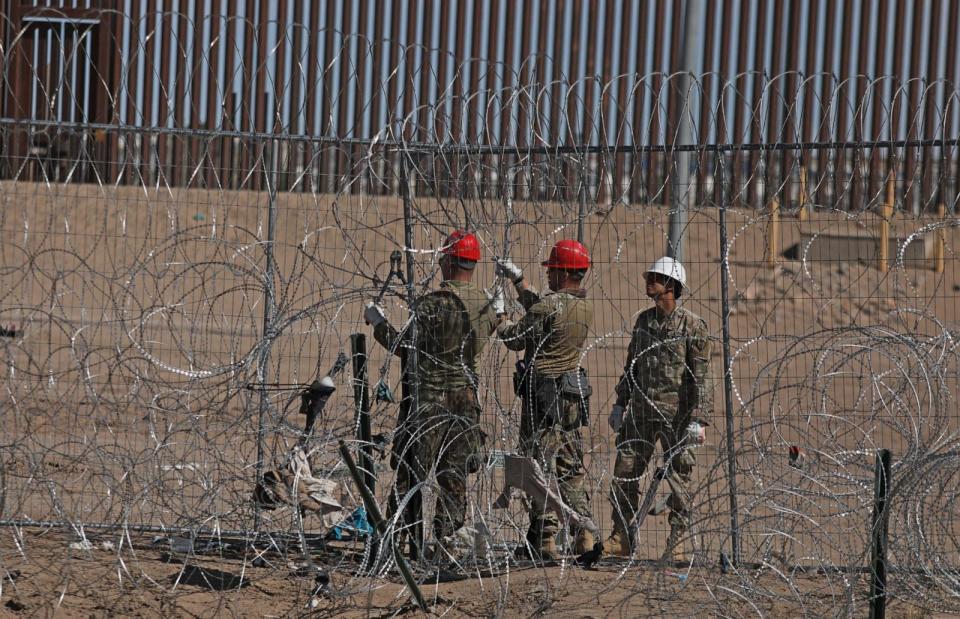 PHOTO: Engineers from the Texas National Guard erect a wire fence on the banks of the Rio Grande river to prevent the illegal entry of migrants from Ciudad Juarez, Chihuahua State, Mexico, March 4, 2024. (Herika Martinez/AFP via Getty Images)