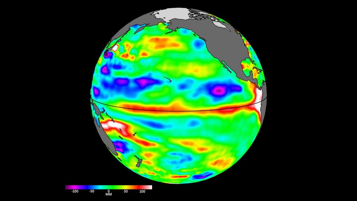  Satellite image of Earth showing areas of the Pacific ocean that are warmer and higher - a sign of El Niño 