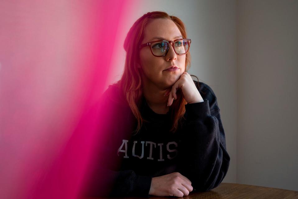 Teraysa Noyes, 33, stands for a photo at her home in Grosse Pointe Park on Tuesday, April 11, 2023. “My experience was a huge flood of relief and answers to questions I had,” said Noyes, who was diagnosed with autism at age 32. “But after that, it was quickly followed up with feelings of grief and anger and ‘this isn’t fair.’ Once we start unmasking, it’s hard for us to put the mask back on.”