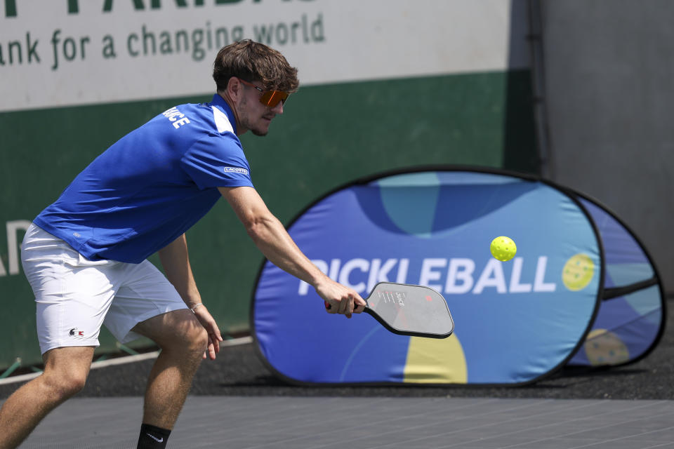 People play pickleball at the French Open tennis tournament at the Roland Garros stadium in Paris, Thursday, June 6, 2024. (AP Photo/Aurelien Morissard)