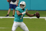 Miami Dolphins quarterback Tua Tagovailoa (1) looks to pass the football during the first half of an NFL football game against the Cincinnati Bengals, Sunday, Dec. 6, 2020, in Miami Gardens, Fla. (AP Photo/Wilfredo Lee)